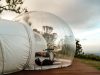 Le Glamping : L’Art du Camping de Luxe an inflatable tent on a wooden deck